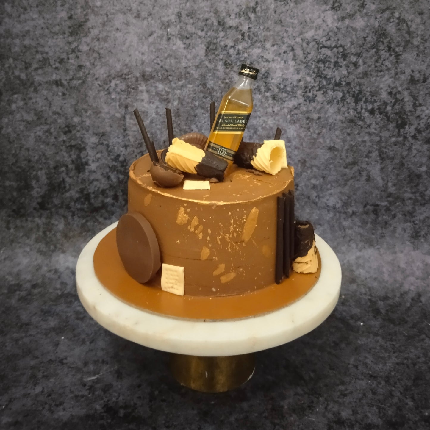 Gold Liquor Theme cake