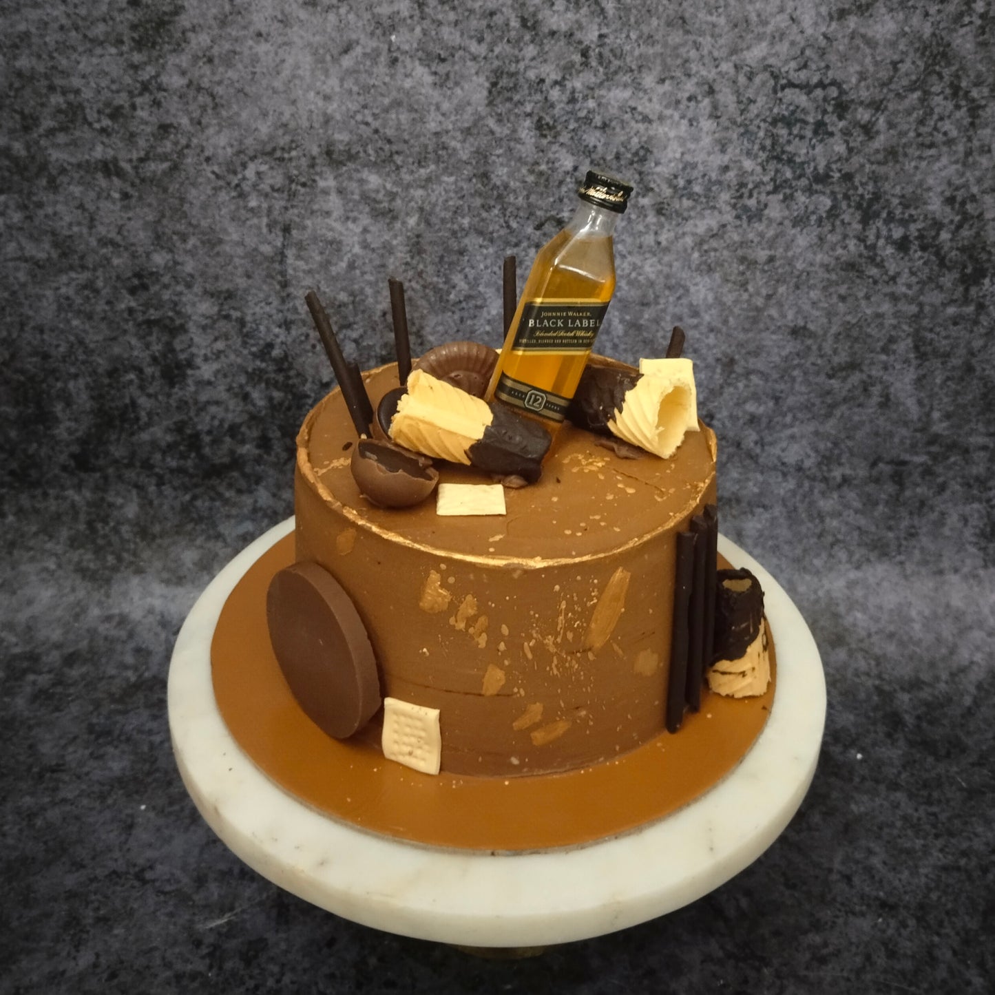 Gold Liquor Theme cake